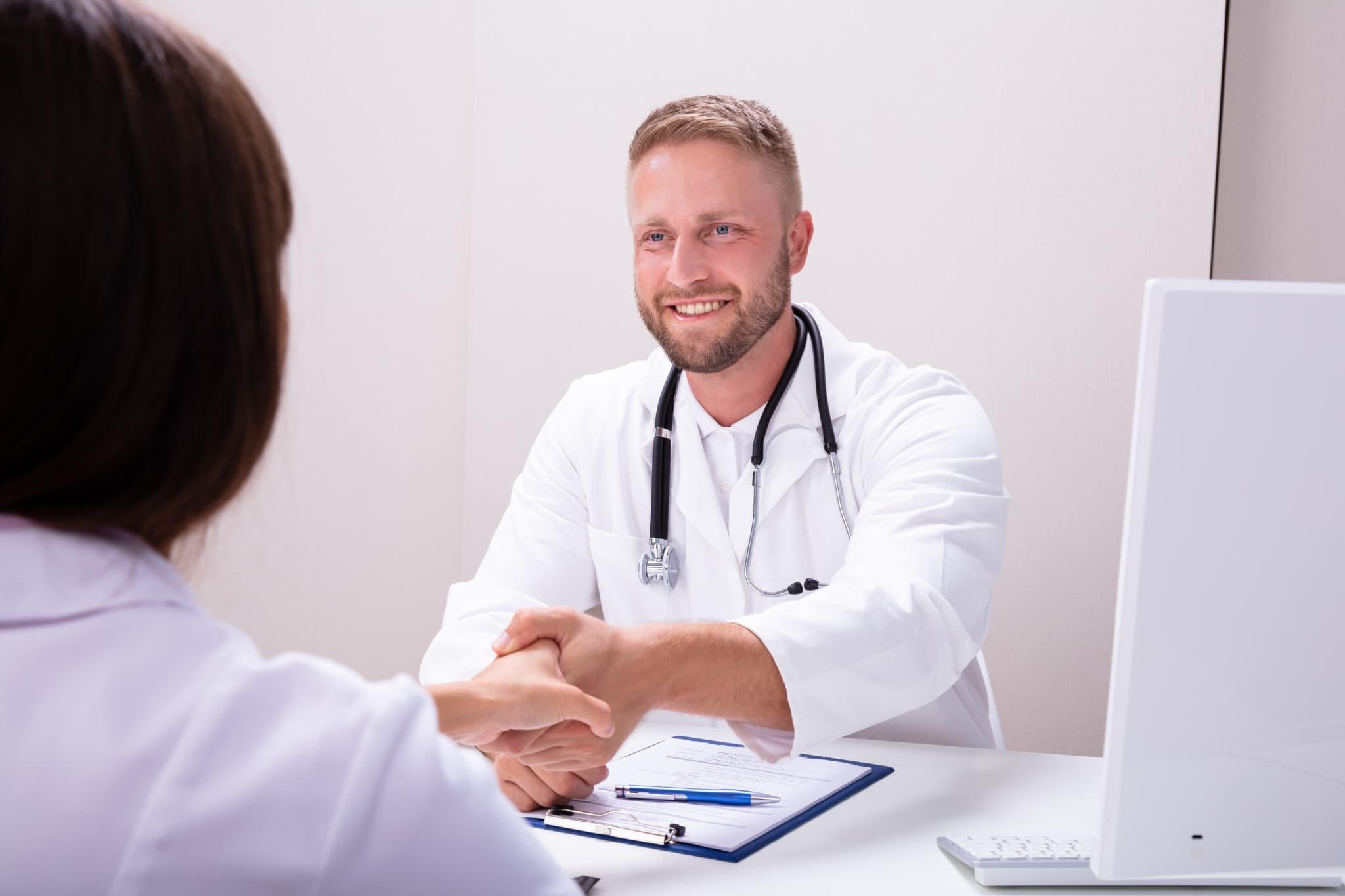 Medical professionals shaking hands