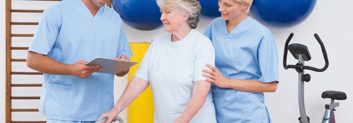 Physical therapy team with a patient