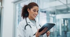 African-American medical professional using a tablet